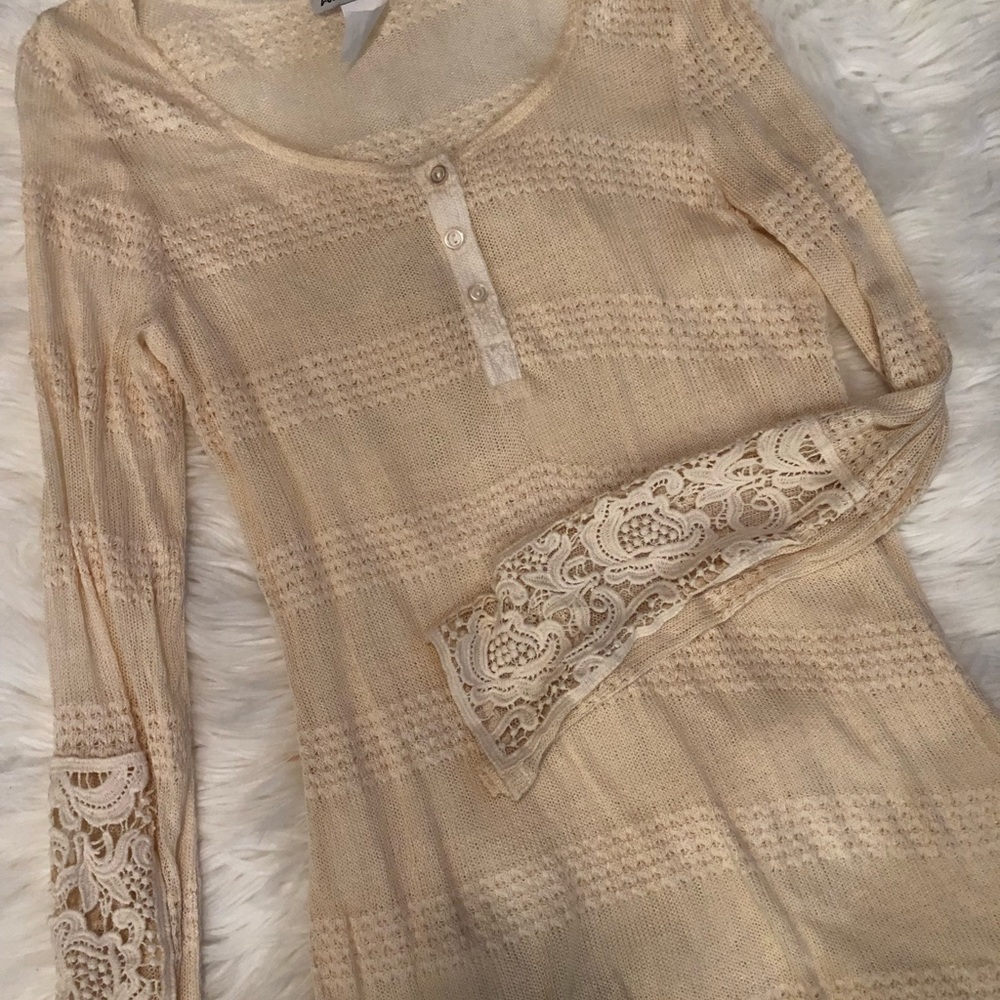 Sheer top perfect for layering.